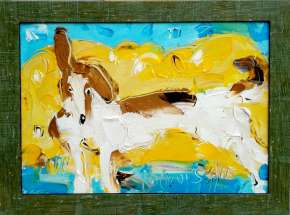 Собака на желтом диване